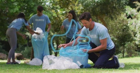 Volunteers picking up plastic litter in park demonstrating teamwork and community