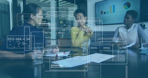 Businesswomen Analyzing Holographic Data in Modern Office