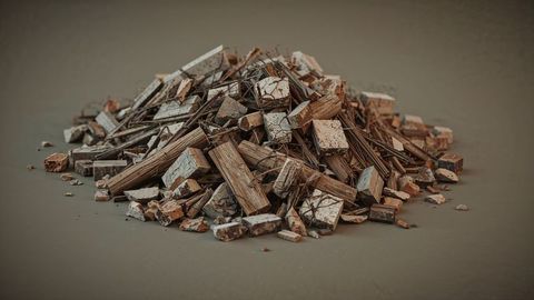 Industrial debris pile with concrete and metal on workshop floor