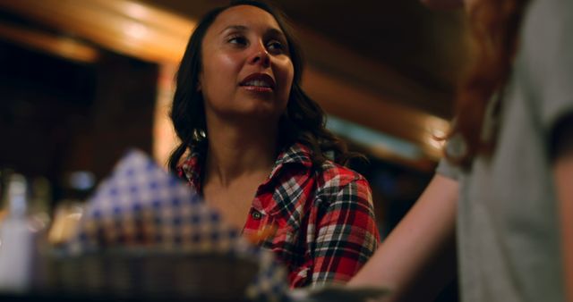 Smiling Woman Having Conversation in Cozy Restaurant - Download Free Stock Images Pikwizard.com