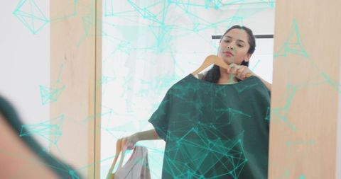 Woman Analyzing Fashion Choices Using Dressing Room Mirror