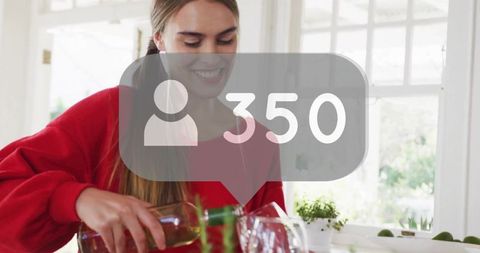 Smiling woman pouring drink into glasses with 350 followers overlay for social hosting