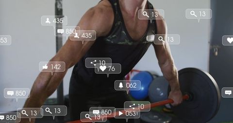 Muscular lifter leaning and gripping barbell with social overlays showing engagement