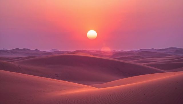 Warm Sunset Over Ethereal Desert Dunes Creating a Serene Landscape
