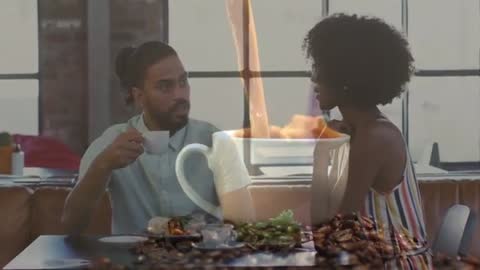 Couple Discussing in Modern Café Loft Setting with Dynamic Graphics