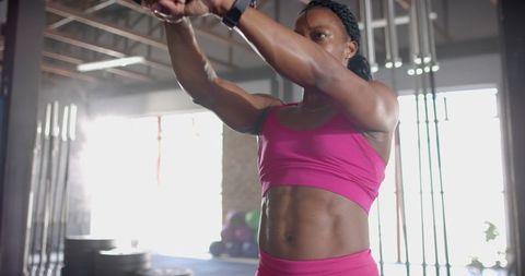 Focused Athlete Lifting Kettlebell in Gym - Download Free Stock Images Pikwizard.com