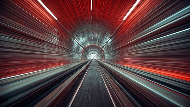 Futuristic Streaking Lights in Metal Tunnel