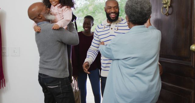 Happy African American Family Greeting at Home Entrance - Download Free Stock Images Pikwizard.com