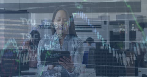 Businessperson Analyzing Digital Financial Charts in Office