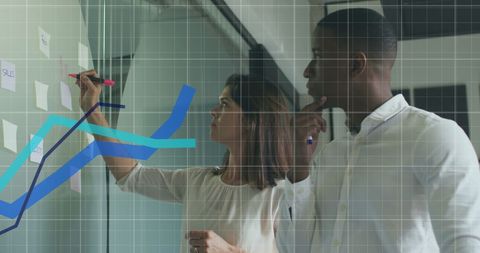 Diverse Professionals Analyzing Business Growth Statistics