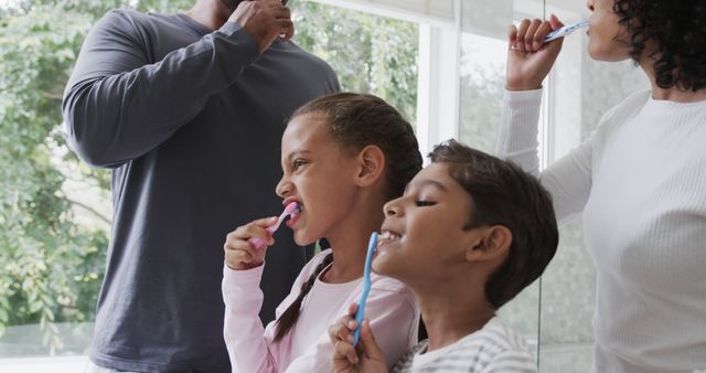 Family Brushing Teeth Together in Bathroom Morning Routine - Download Free Stock Images Pikwizard.com