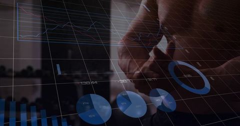 Muscular man flexing in dim gym with fitness analytics overlay and blue data charts