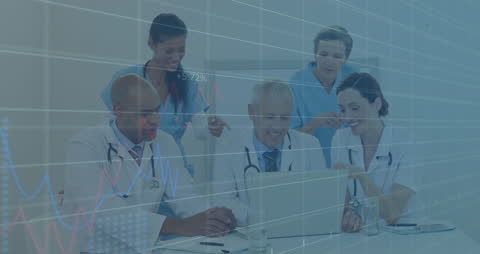 Diverse Team of Doctors Analyzing Data on Laptop
