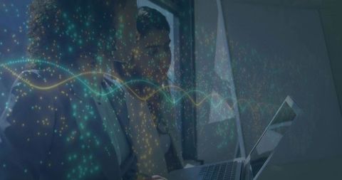 Collaborating Businesswomen Harness Digital Innovation