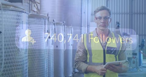 Factory Worker Monitoring Digital Engagement on Tablet