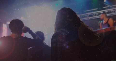 Fans Enjoy Live Concert with Atmospheric Stage Lighting