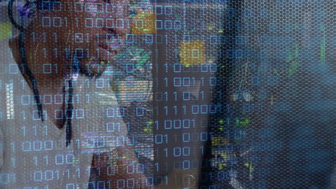 Businessman Wearing VR Headset with Binary Code Overlay