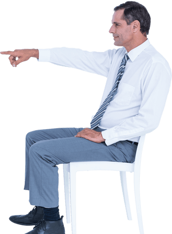 Caucasian businessman pointing while sitting transparent background