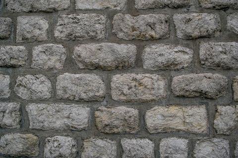 Rugged Stone Brick Wall Texture Close-up