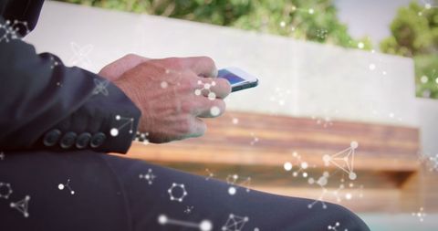 Business Professional Checking Smartphone Amidst Digital Network