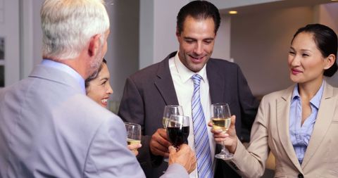 Professional Colleagues Socializing Over Drinks