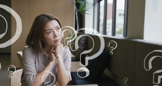 Image of question marks over asian businesswoman thinking - Download Free Stock Photos Pikwizard.com