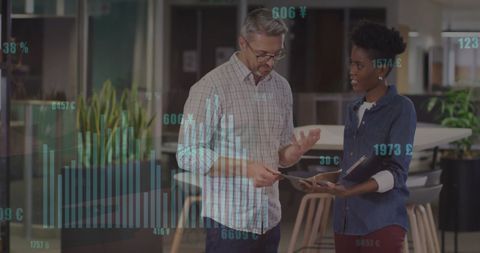 Colleagues Analyzing Financial Data with Digital Concept Overlay