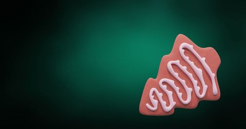 Festive christmas tree gingerbread cookie with icing