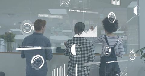 Team collaborating at glass wall analyzing dashboards and brainstorming data-driven strategy