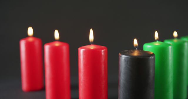 Kwanzaa Candles Lit Against Dark Background - Download Free Stock Images Pikwizard.com