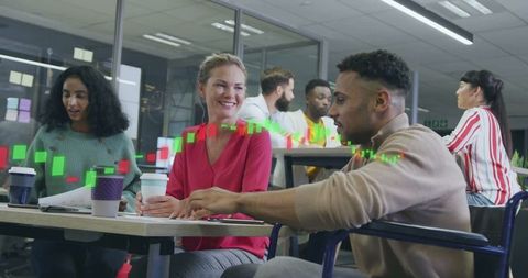 Diverse team analyzing data with digital graph arrows