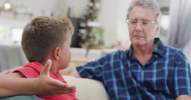 Grandfather Listening to Grandson During Serious Conversation - Download Free Stock Images Pikwizard.com