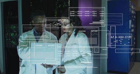 Engineers analyzing holographic data overlays in datacenter using tablet for diagnostics