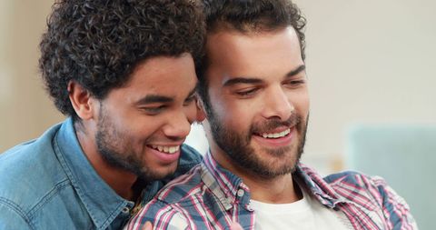 Interracial Friends Smiling Sharing Bonding Moment Indoors - Download Free Stock Images Pikwizard.com