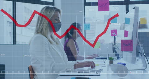Business Team Analyzing Financial Graph During Pandemic