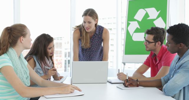 Young Professionals Discussing Sustainable Ideas in Office Meeting - Download Free Stock Images Pikwizard.com