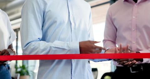 Team Celebrating Startup with Ribbon Cutting Ceremony