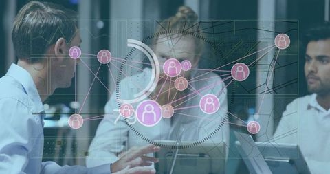 Business professionals analyzing digital network diagram in modern office