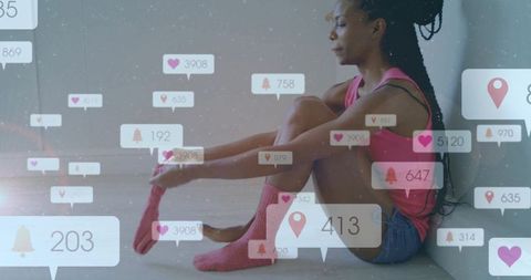 Woman Puts on Socks with Overlapping Social Media Icons