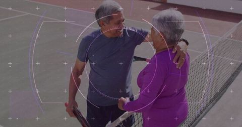 Senior Couple Bonding on Tennis Court Embracing Active Lifestyle