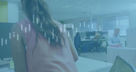 Business woman in modern office collaborating with colleagues