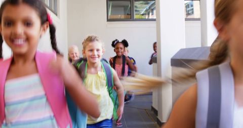 Joyful Children Running in School Hallway Celebrating - Download Free Stock Images Pikwizard.com