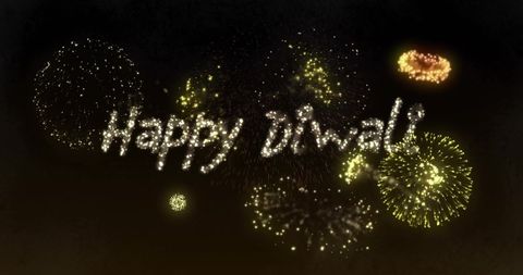 Colorful fireworks display with happy diwali message