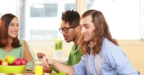 Diverse Friends Enjoying Meal and Engaging Conversation - Download Free Stock Images Pikwizard.com