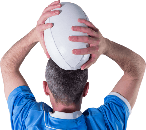 Rugby player preparing to throw ball on transparent background
