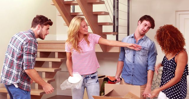 Young Friends Moving Into New Home, Unpacking Boxes and Laughing - Download Free Stock Images Pikwizard.com