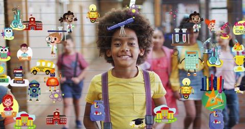 Happy schoolboy with educational icon overlay celebrating learning