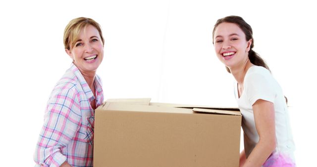 Mother and Daughter Moving Box Together - Download Free Stock Images Pikwizard.com