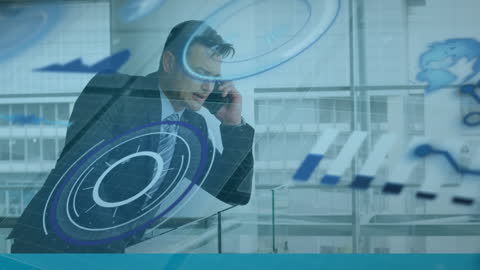 Businessman Engaging in Phone Conversation with Digital Overlay