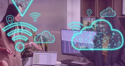 Colleagues Collaborating on Projects with Digital Technology in Modern Office